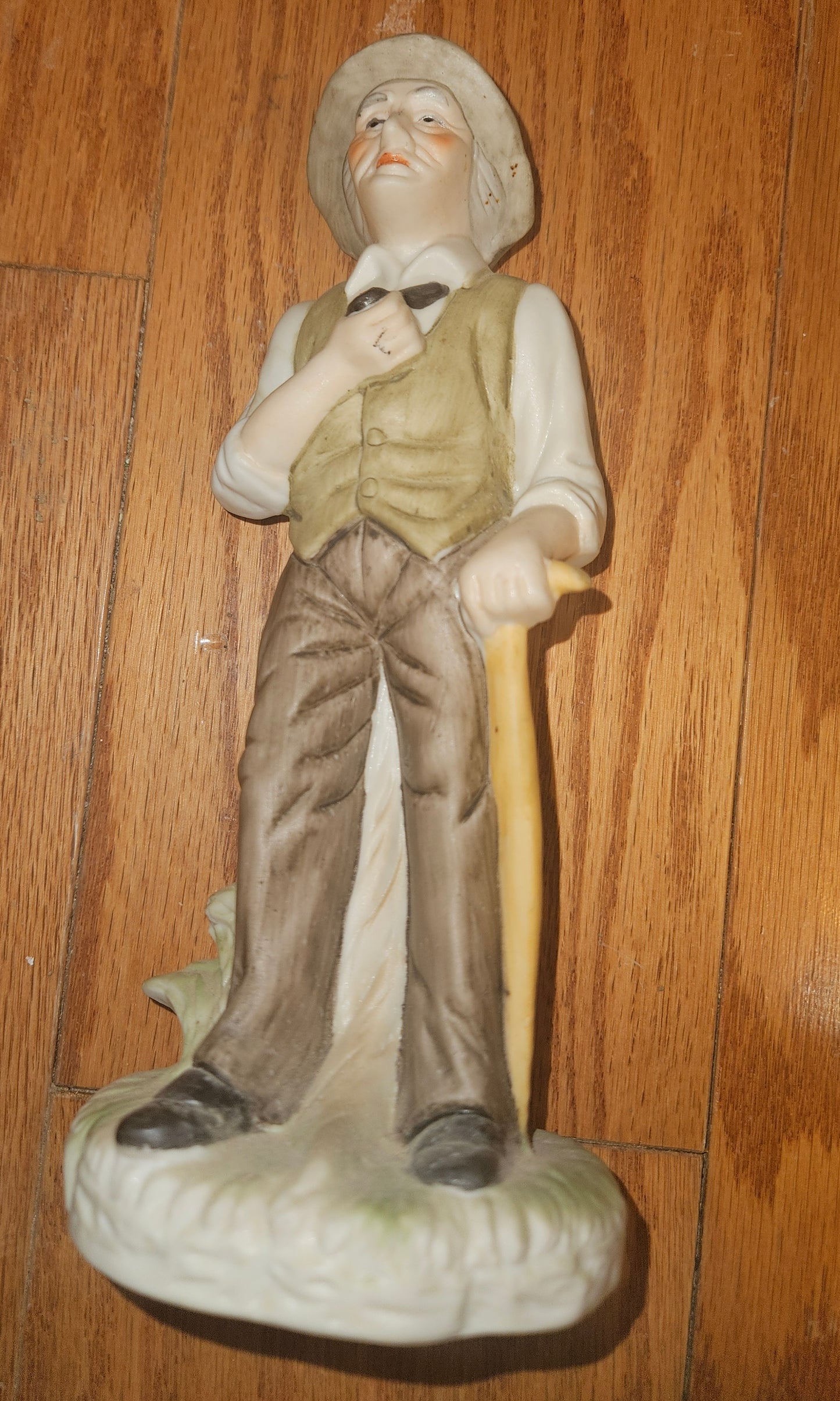 PEASANT FARMER BISQUE FIGURINE